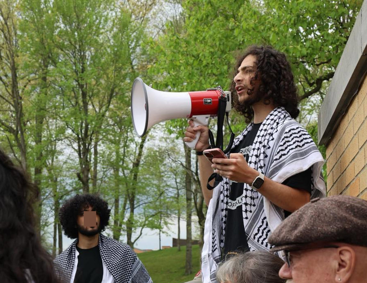 Yazun Issawi, Kent State,  speaking with a megaphone